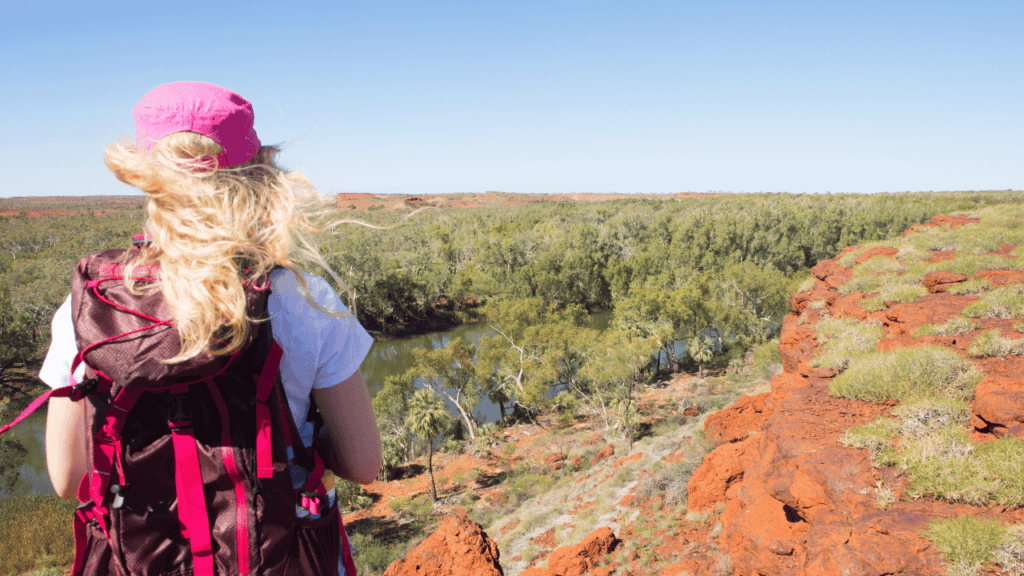 A woman hiking in the Australian Outback.